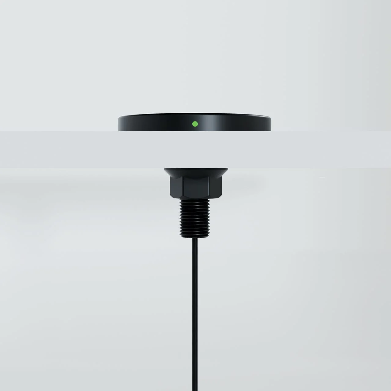 SwiftPro pad on a surface, with the threaded stem and nut beneath it
